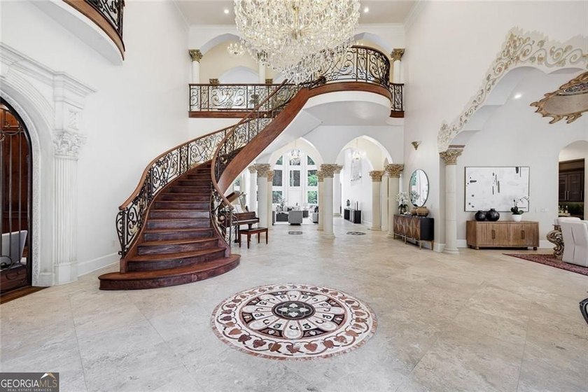 Welcome to one of Atlanta's most extraordinary estates, where - photo 6