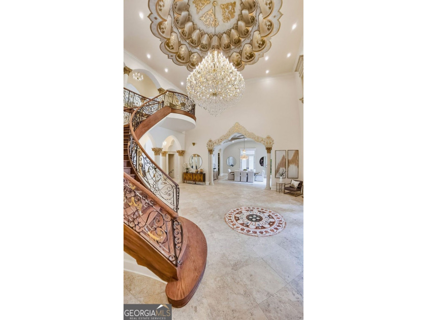 Welcome to one of Atlanta's most extraordinary estates, where - photo 7