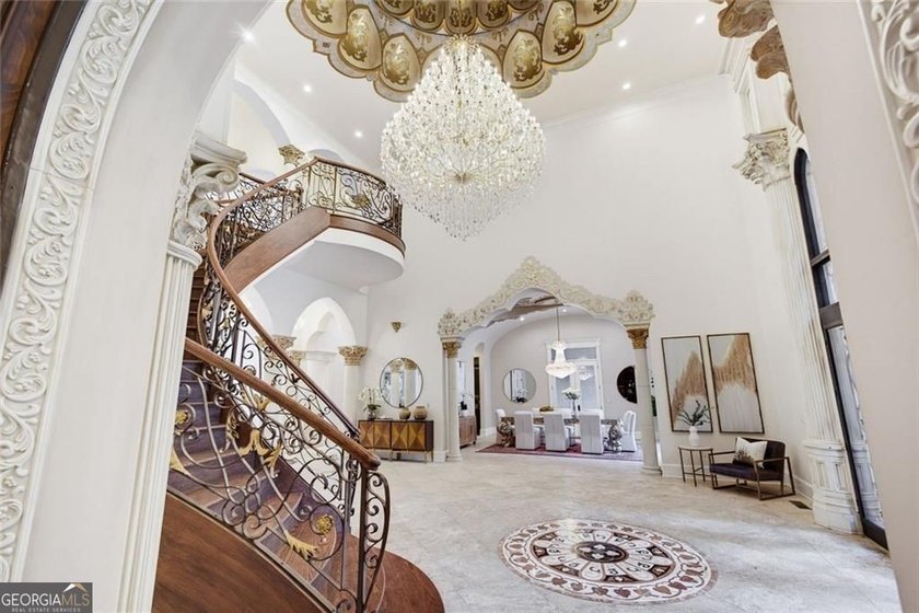 Welcome to one of Atlanta's most extraordinary estates, where - photo 9