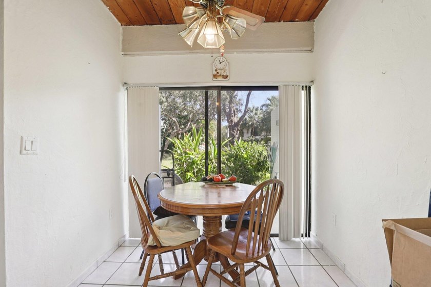 Discover a rare corner-unit retreat in a secure, gated community - photo 12