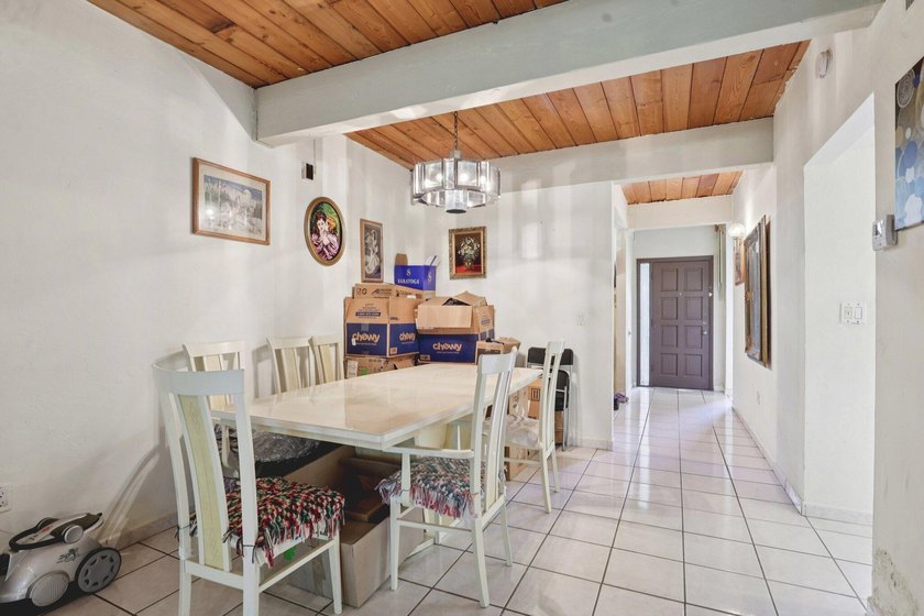 Discover a rare corner-unit retreat in a secure, gated community - photo 15