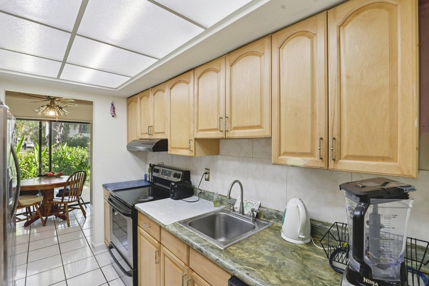 Discover a rare corner-unit retreat in a secure, gated community - photo 18