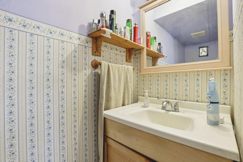 Discover a rare corner-unit retreat in a secure, gated community - photo 20