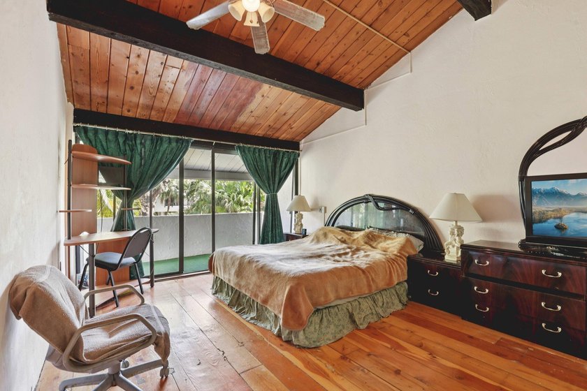 Discover a rare corner-unit retreat in a secure, gated community - photo 22
