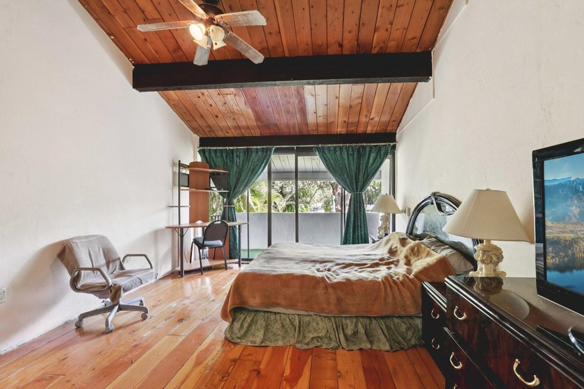 Discover a rare corner-unit retreat in a secure, gated community - photo 23