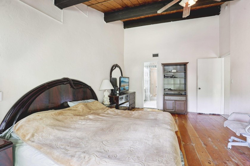 Discover a rare corner-unit retreat in a secure, gated community - photo 24
