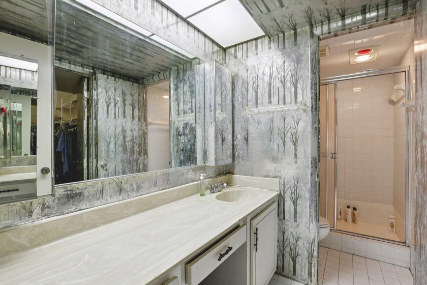 Discover a rare corner-unit retreat in a secure, gated community - photo 25