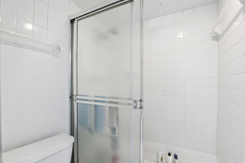 Discover a rare corner-unit retreat in a secure, gated community - photo 26