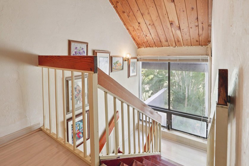 Discover a rare corner-unit retreat in a secure, gated community - photo 28