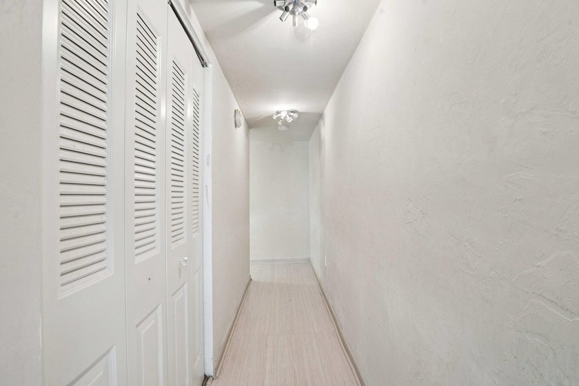 Discover a rare corner-unit retreat in a secure, gated community - photo 29