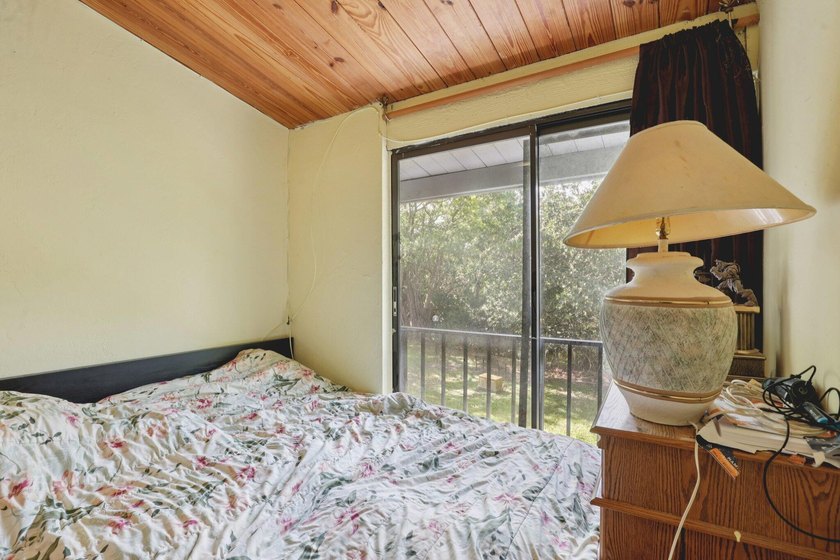 Discover a rare corner-unit retreat in a secure, gated community - photo 33