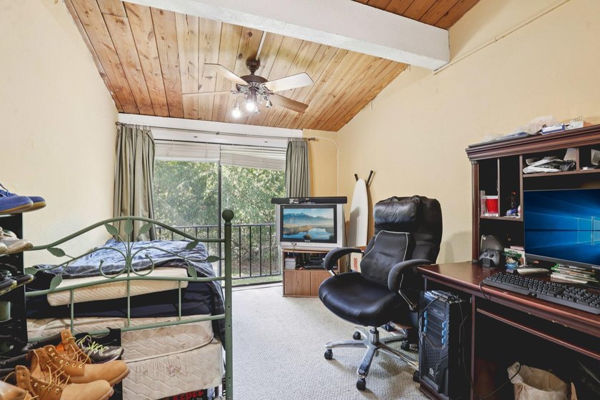 Discover a rare corner-unit retreat in a secure, gated community - photo 34