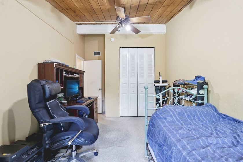 Discover a rare corner-unit retreat in a secure, gated community - photo 35