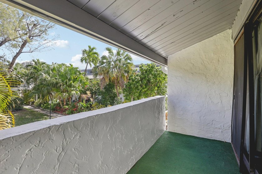Discover a rare corner-unit retreat in a secure, gated community - photo 39