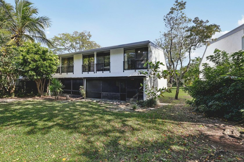 Discover a rare corner-unit retreat in a secure, gated community - photo 40