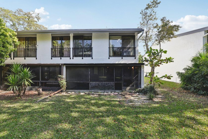 Discover a rare corner-unit retreat in a secure, gated community - photo 41