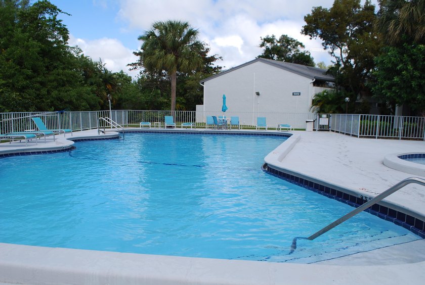 Discover a rare corner-unit retreat in a secure, gated community - photo 43