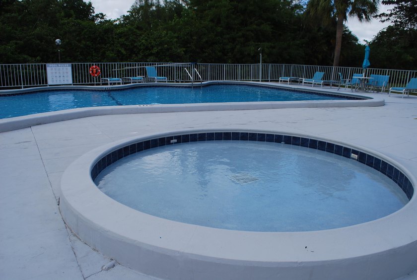 Discover a rare corner-unit retreat in a secure, gated community - photo 44
