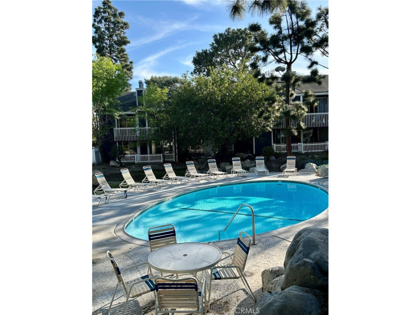 Welcome to this beautifully updated end-unit condo in the - photo 4