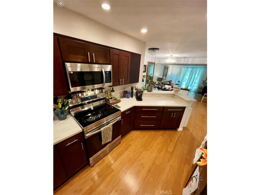 Welcome to this beautifully updated end-unit condo in the - photo 9