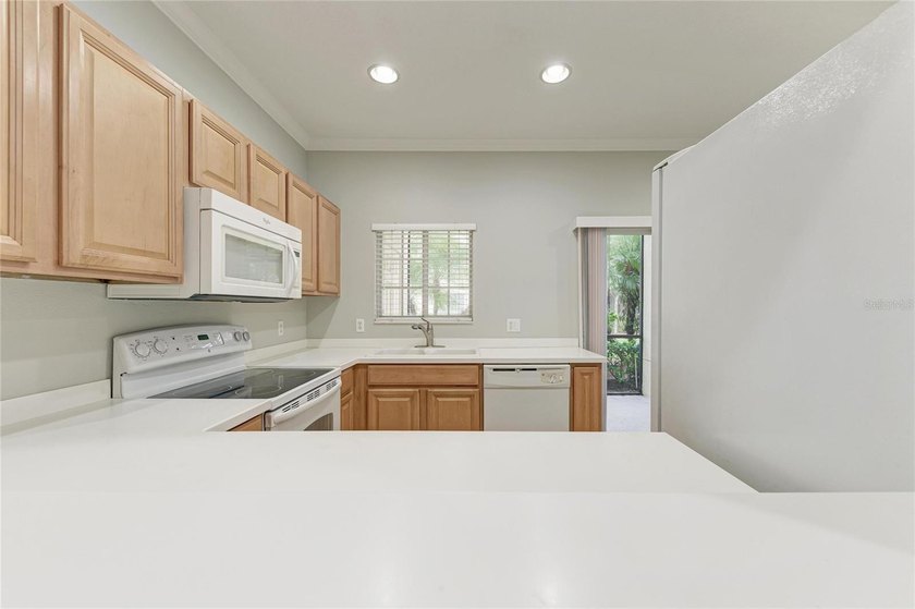 Step into this spacious and well-designed townhome featuring a - photo 11