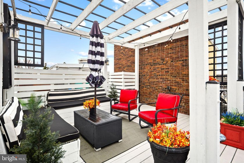This beautifully updated penthouse offers a unique blend of - photo 13