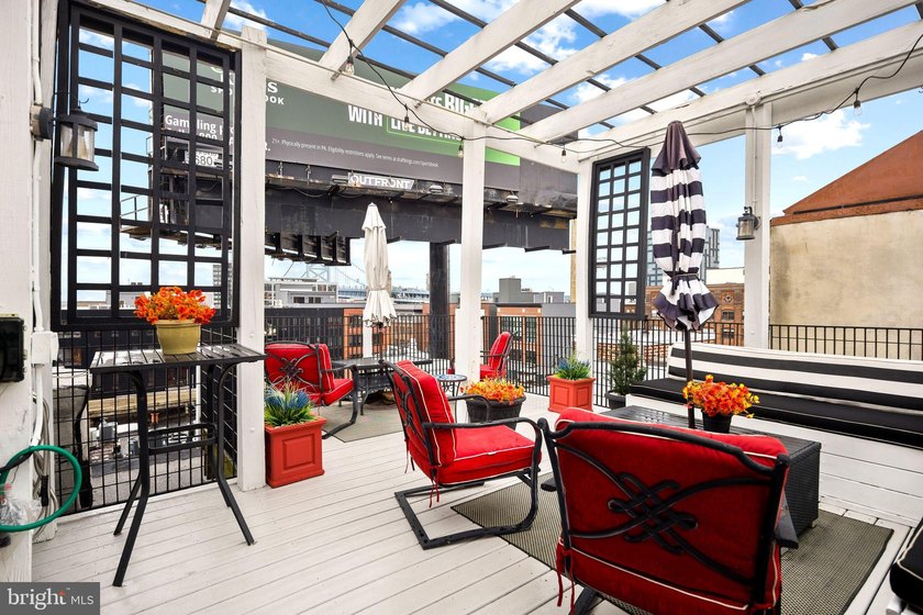This beautifully updated penthouse offers a unique blend of - photo 15