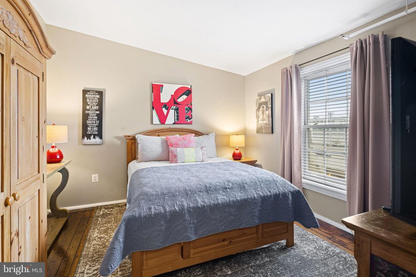 This beautifully updated penthouse offers a unique blend of - photo 22