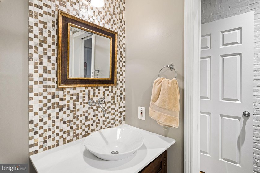 This beautifully updated penthouse offers a unique blend of - photo 24