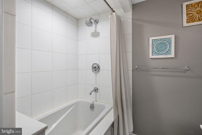 This beautifully updated penthouse offers a unique blend of - photo 25