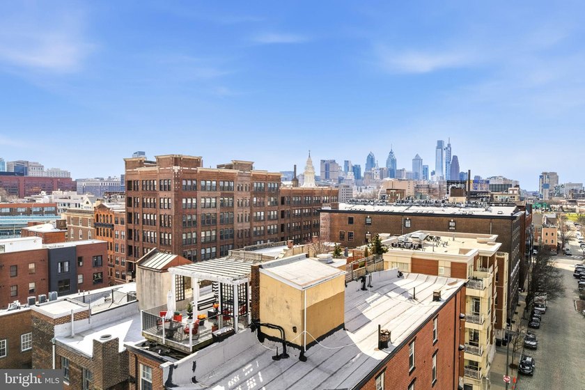 This beautifully updated penthouse offers a unique blend of - photo 28