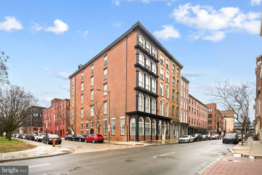 This beautifully updated penthouse offers a unique blend of - photo 29