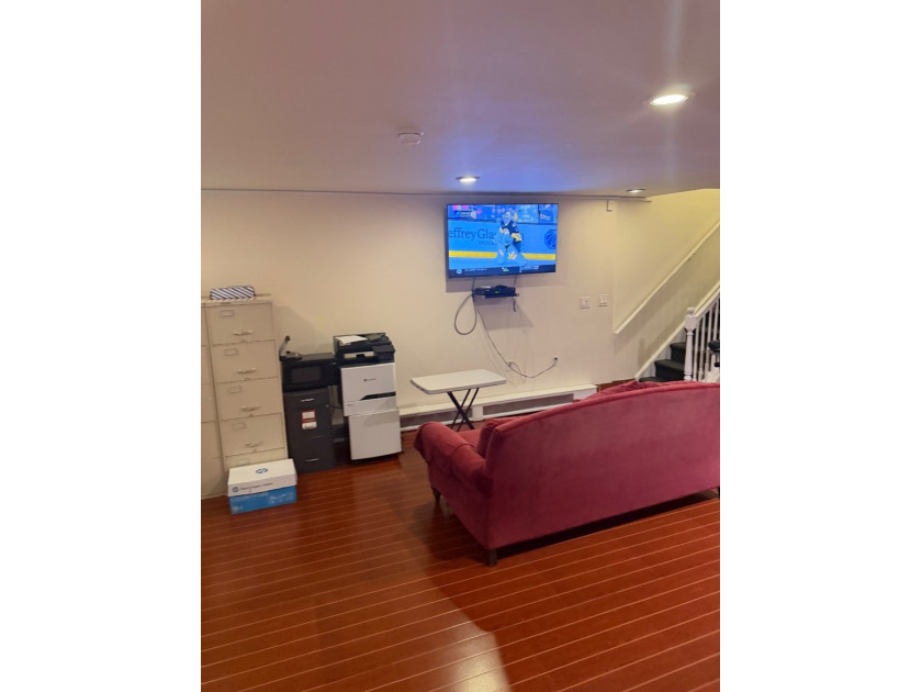 Introducing a beautifully maintained two-family home situated in - photo 8