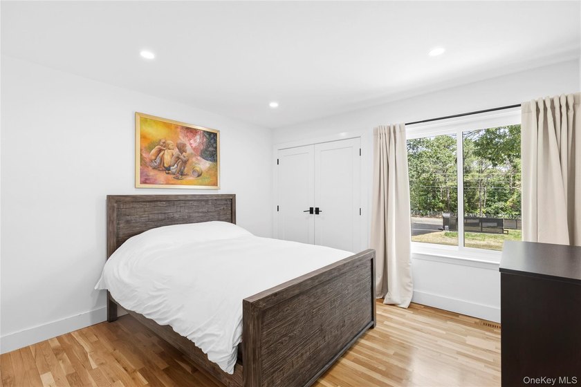 Thoughtfully renovated Southampton property set behind an - photo 12