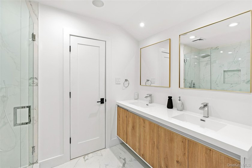 Thoughtfully renovated Southampton property set behind an - photo 16