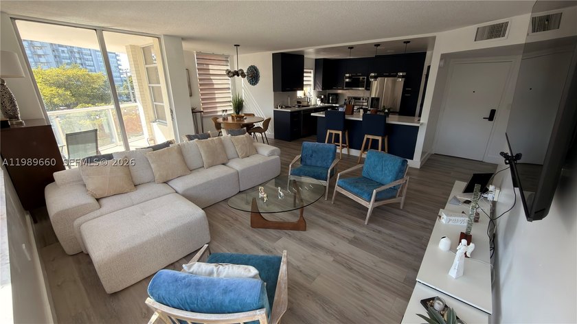 Beautifully updated and move-in ready 2/2 unit in the highly - photo 2