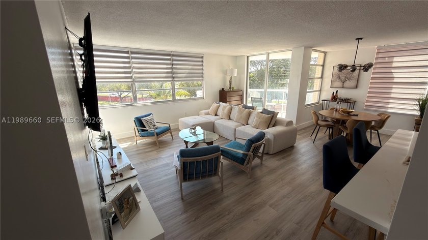 Beautifully updated and move-in ready 2/2 unit in the highly - photo 3