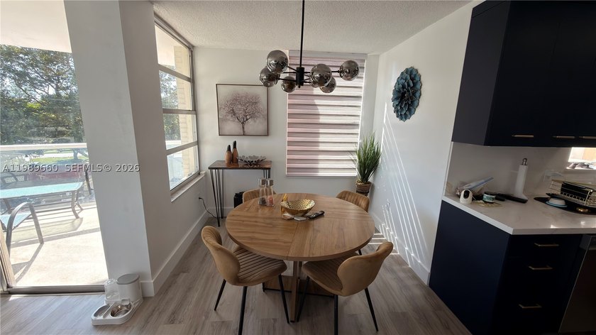 Beautifully updated and move-in ready 2/2 unit in the highly - photo 8