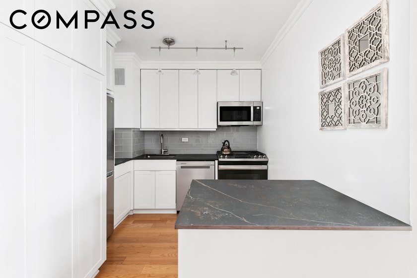 Welcome to Residence 19O at Plaza 400 a modern, sun-drenched - photo 5