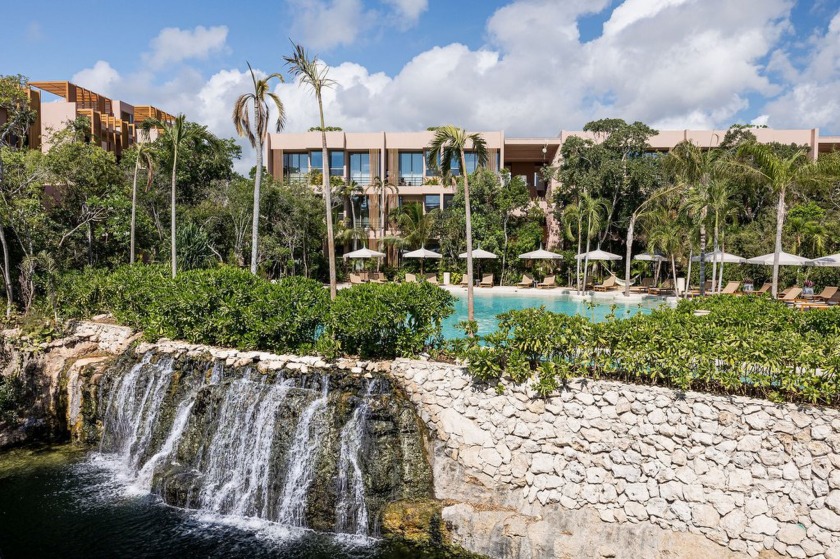 Tucked away in the lush embrace of Aldea Zama, Aflora is more - photo 22