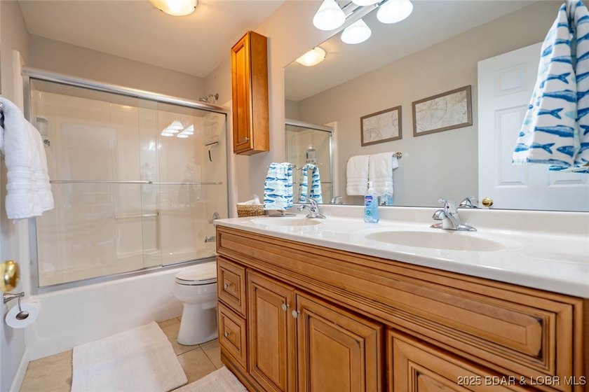 Welcome to this beautifully remodeled, walk-in end unit at The - photo 15