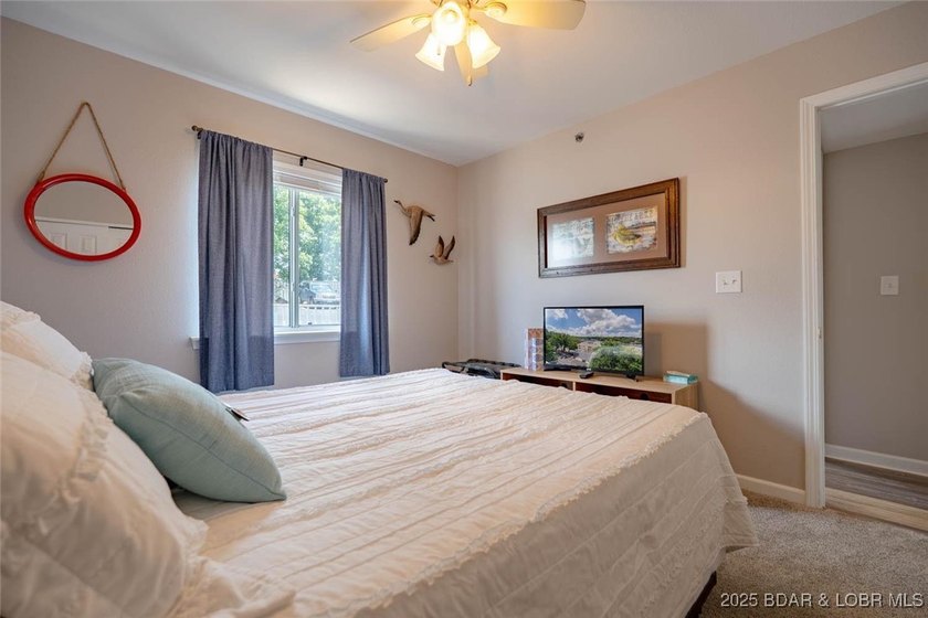 Welcome to this beautifully remodeled, walk-in end unit at The - photo 23