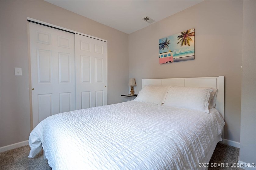 Welcome to this beautifully remodeled, walk-in end unit at The - photo 26