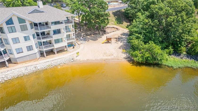 Welcome to this beautifully remodeled, walk-in end unit at The - photo 42
