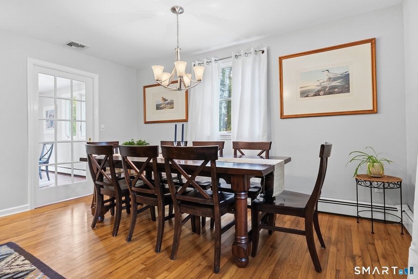 Centrally located yet private, this impeccably maintained - photo 3