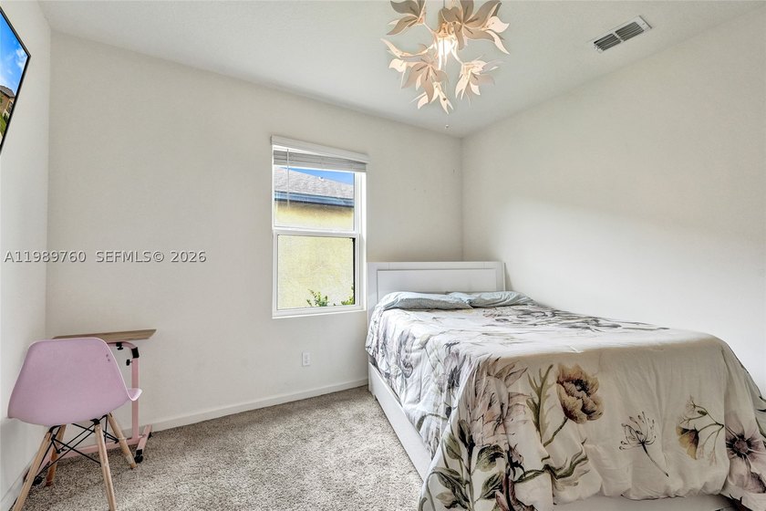 Newly repositioned. This 2021-built single-story 4BR/2BA home in - photo 8