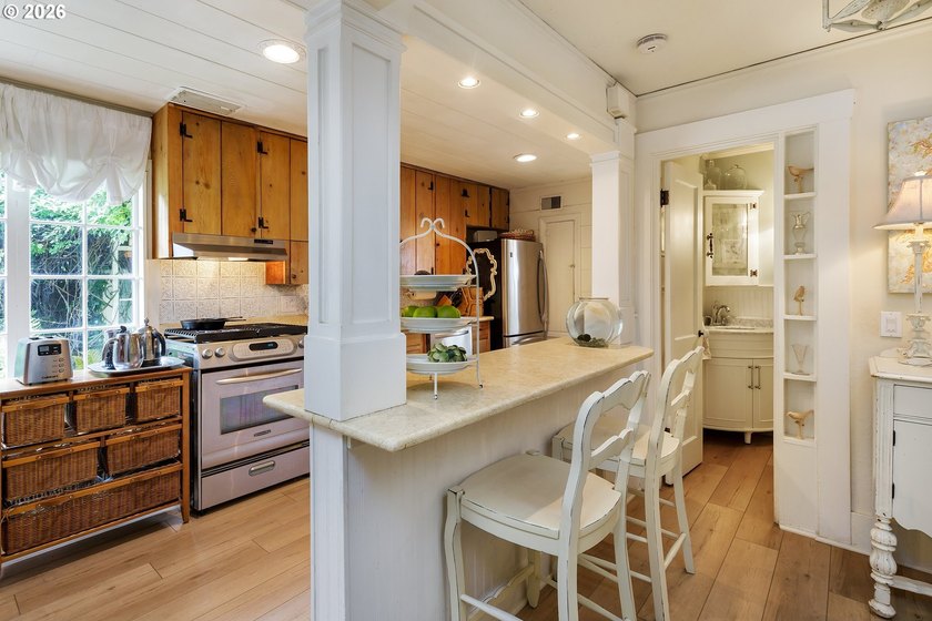 A one-of-a-kind historic gem, this Storybook Cottage was built - photo 11