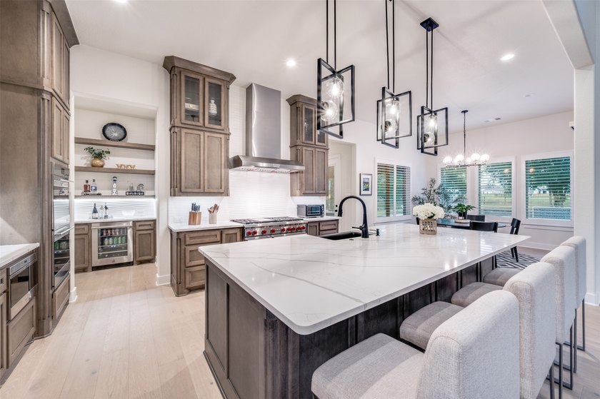 Completed in 2025, this exceptional Toll Brothers residence - photo 12