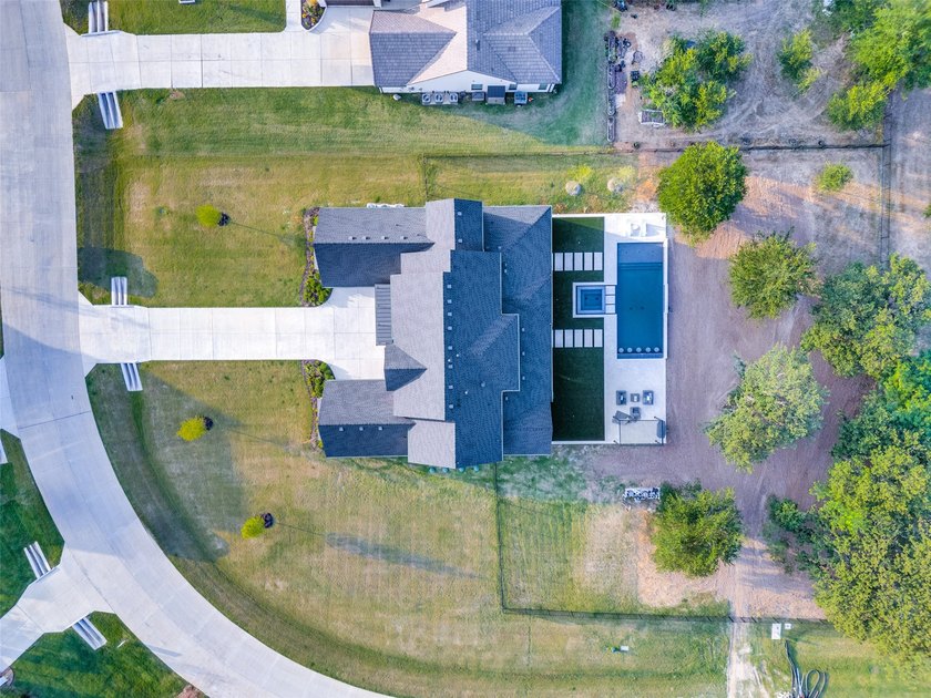 Completed in 2025, this exceptional Toll Brothers residence - photo 35