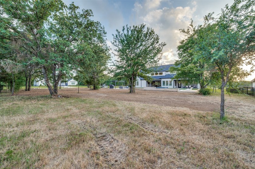 Completed in 2025, this exceptional Toll Brothers residence - photo 36